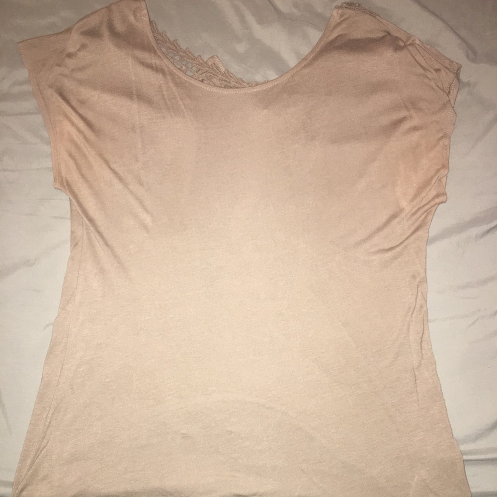 Lightly used t-shirt with lace back
